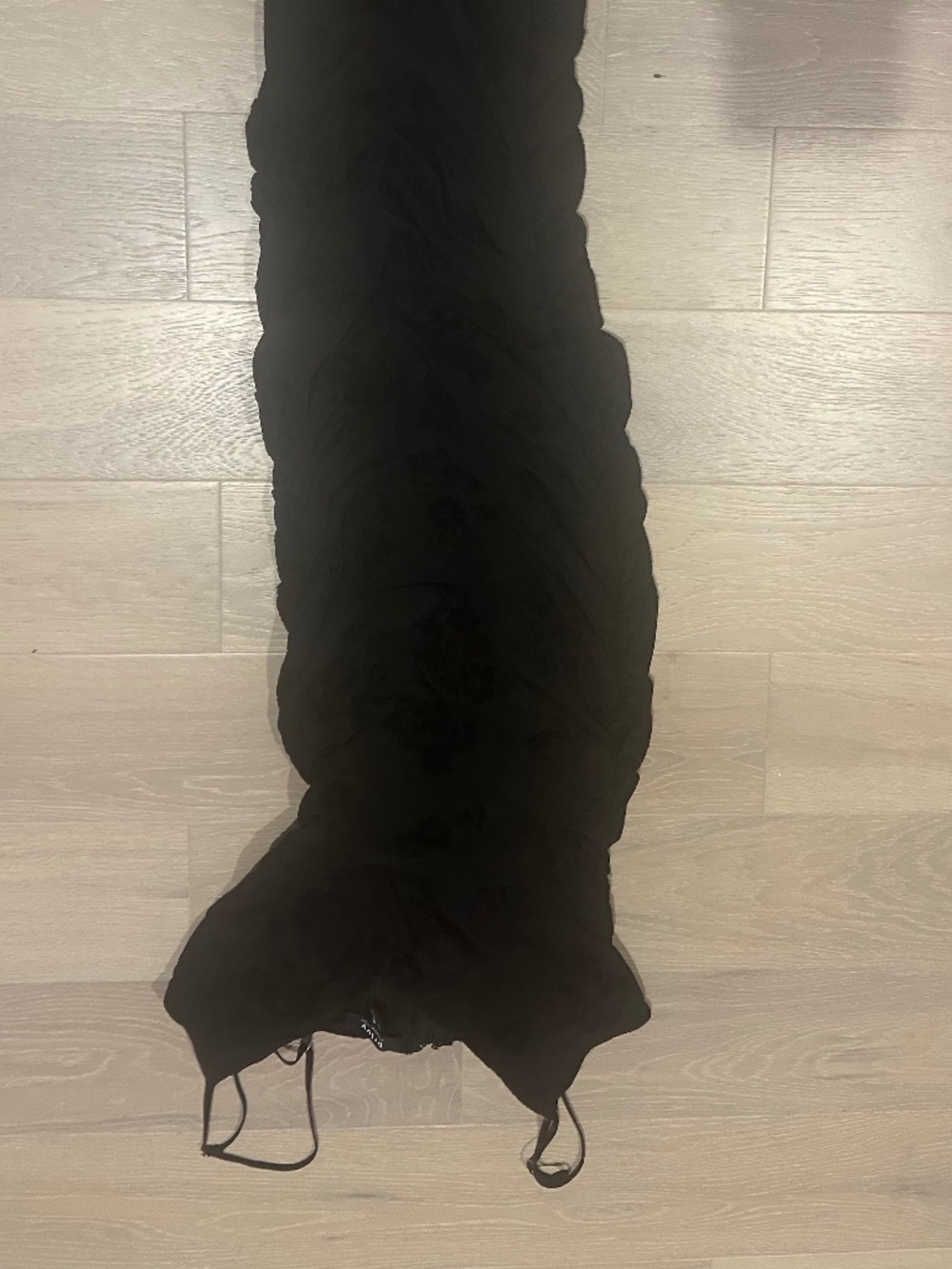 black midi ruched dress with spaghetti straps and black velvet flowers